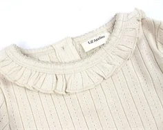 Lil Atelier sheer bliss flæse top